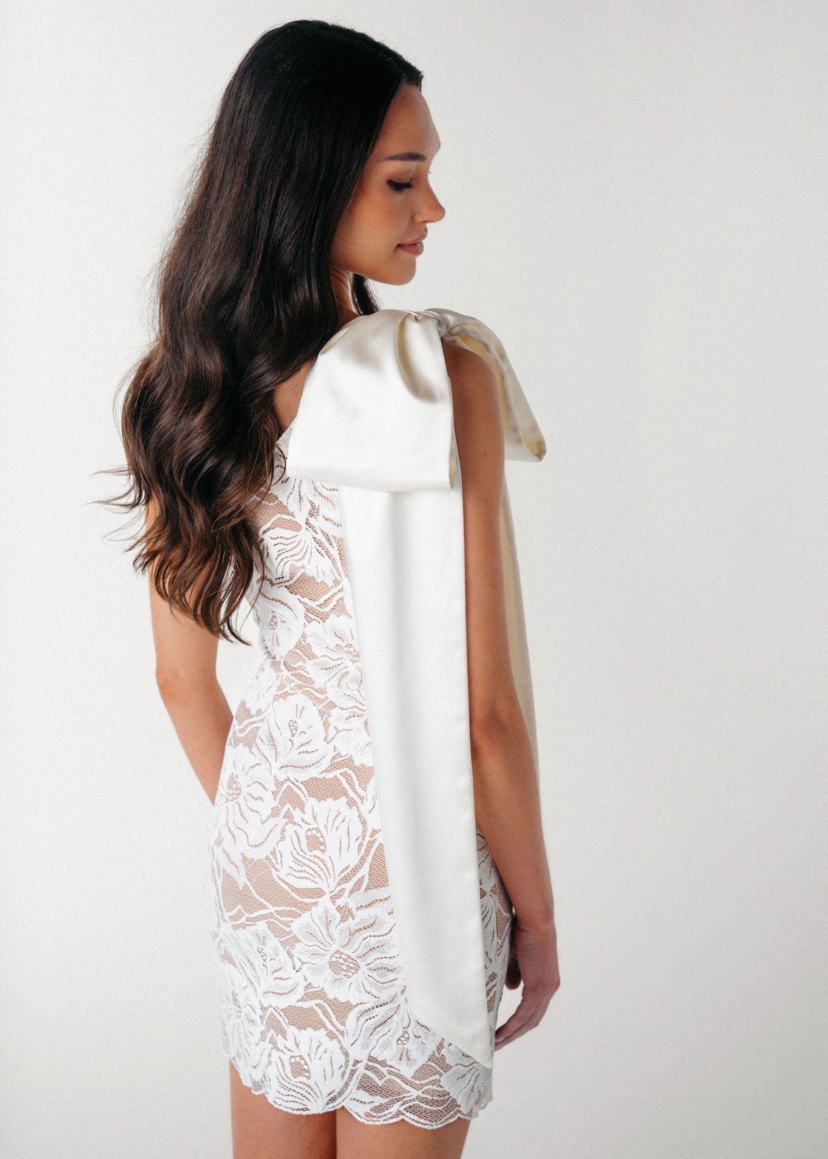 Samantha Wood Bridal Era Dress Collection Jolie One Shoulder Lace Dress with Oversized Satin Bow Back Detail