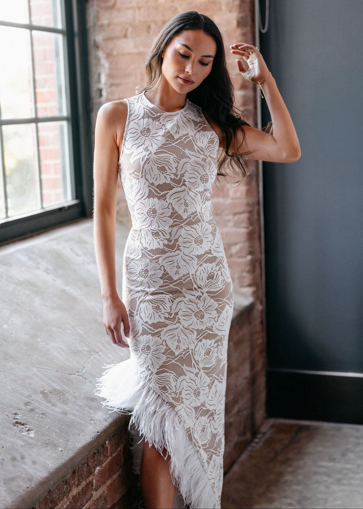 Samantha Wood Fashion Designer Bridal Era Collection Jules Ivory Lace Ponte Lined Long Dress with Ostrich Feather Trim Slit Campaign Image on Model Morgan Romano