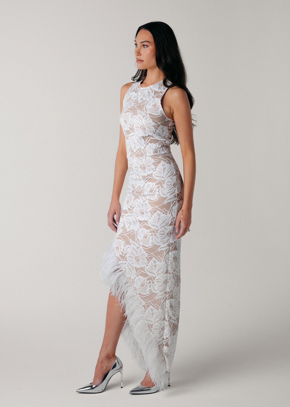 Samantha Wood Fashion Designer Bridal Era Collection Jules Ivory Lace Ponte Lined Long Dress with Ostrich Feather Trim Slit Side View on Model Morgan Romano